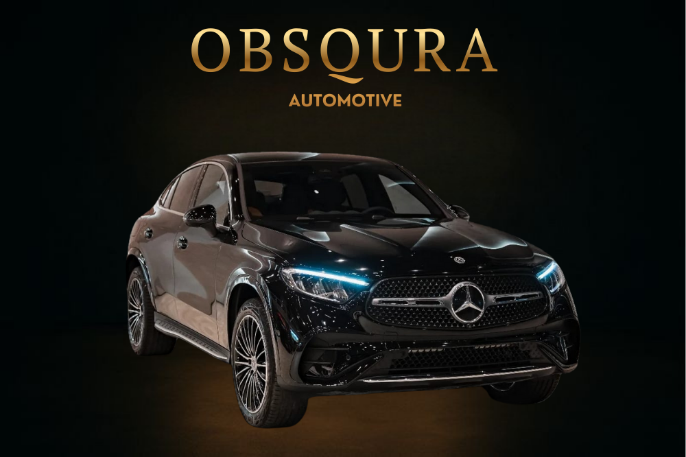 A black Mercedes-Benz SUV with LED headlights, parked in front of a black background with the words "OBSCURA AUTO MCVTIVE" written above it.