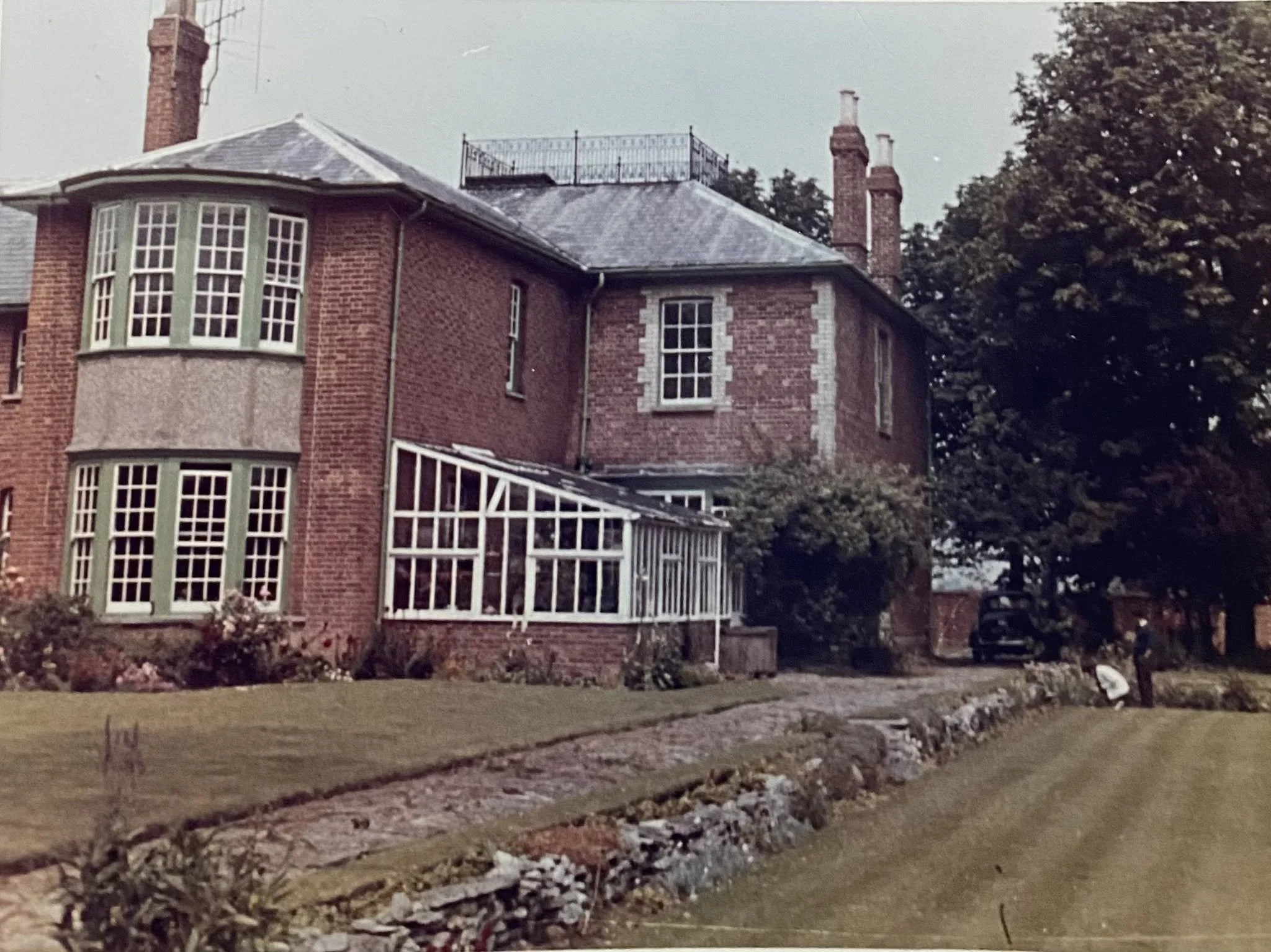 This is Haydon Hill House, a large 8-bedroom house that stood where Alderson Close is today (by Intalbury Avenue). 
Julia said "These pictures are of Haydon Hill House, which was demolished (from memory) in the early 1980s. Once a grand old house, it