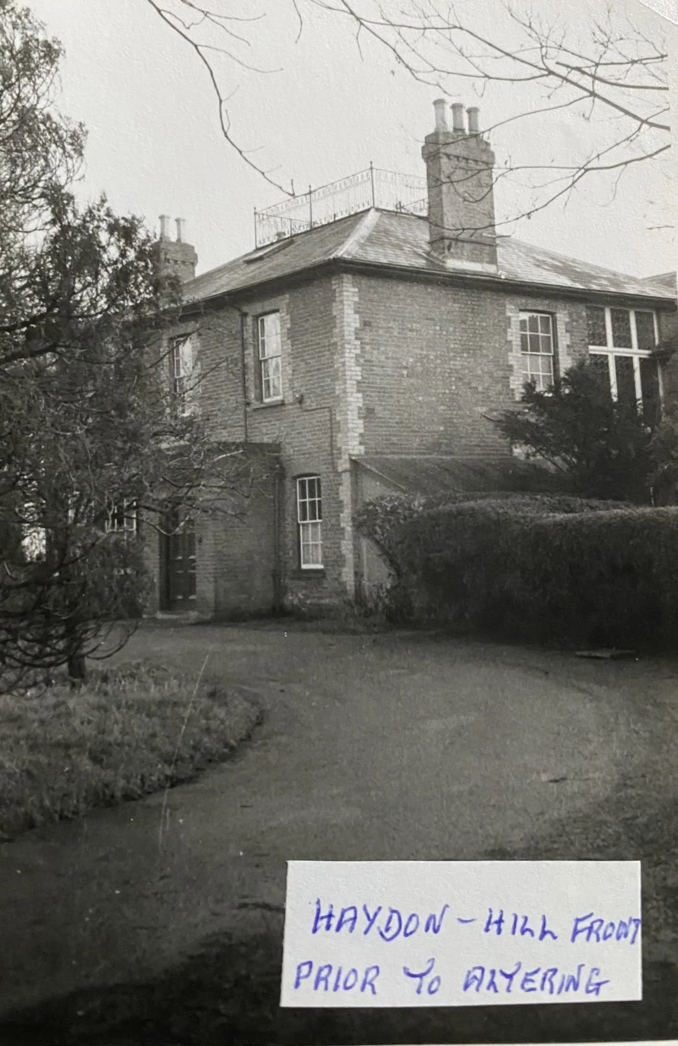 This is Haydon Hill House, a large 8-bedroom house that stood where Alderson Close is today (by Intalbury Avenue). 
Julia said "These pictures are of Haydon Hill House, which was demolished (from memory) in the early 1980s. Once a grand old house, it