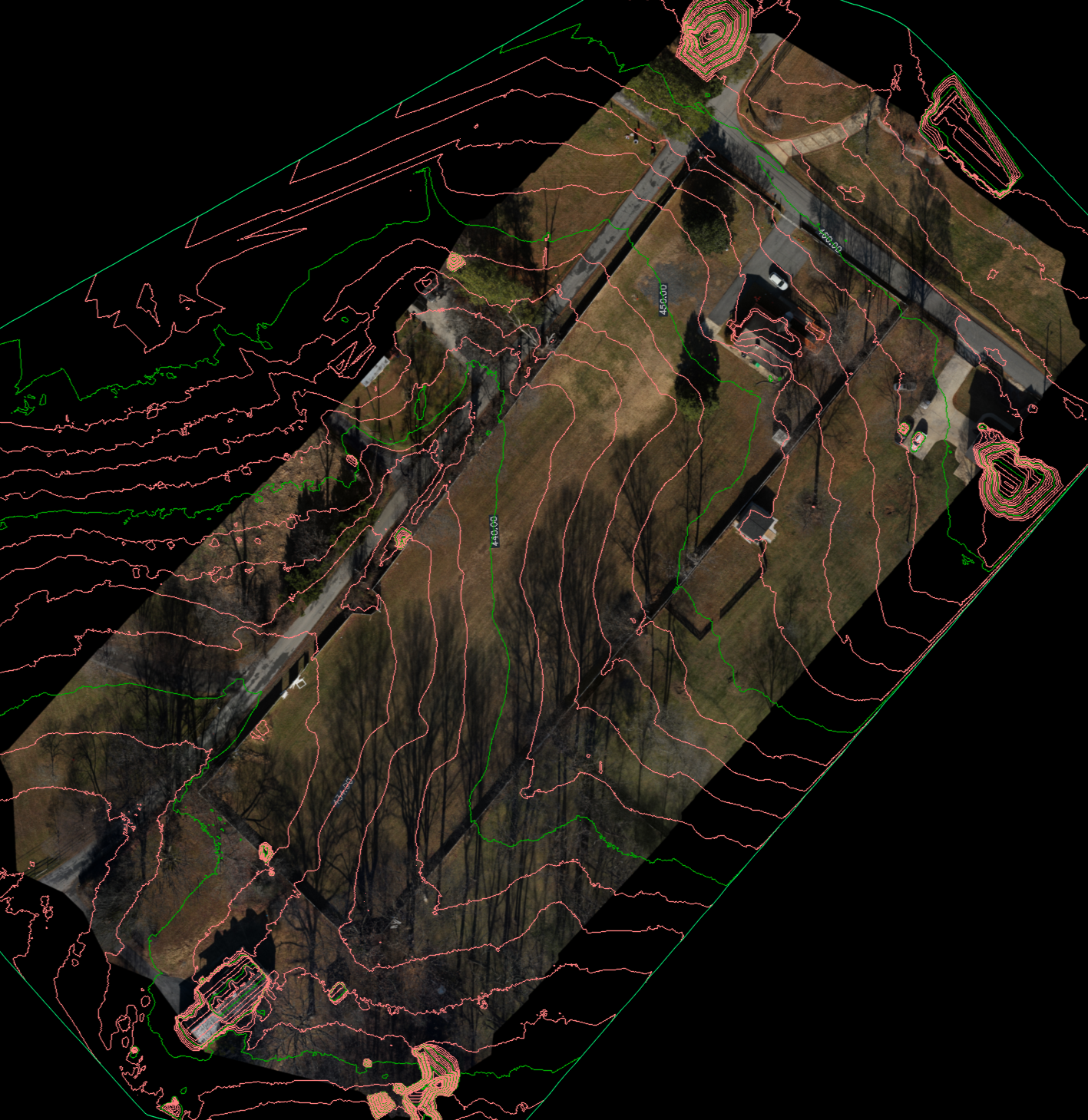Aerial view of houses with a landscape overlay including contour lines and elevation points.