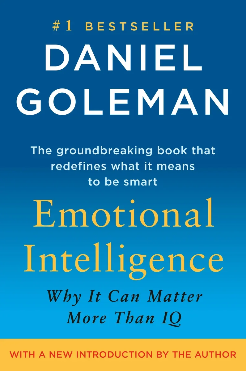 Cover of the book titled 'Emotional Intelligence: Why It Can Matter More Than IQ' by Daniel Goleman. The cover is blue with yellow and black text, featuring a subtitle about its focus on emotional intelligence and a note about a new introduction by the author.
