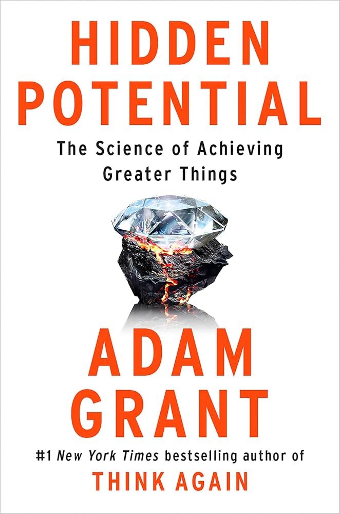 Book cover for "Hidden Potential" by Adam Grant. The cover features a diamond emerging from a volcanic eruption with lava, and the title is in large orange letters.