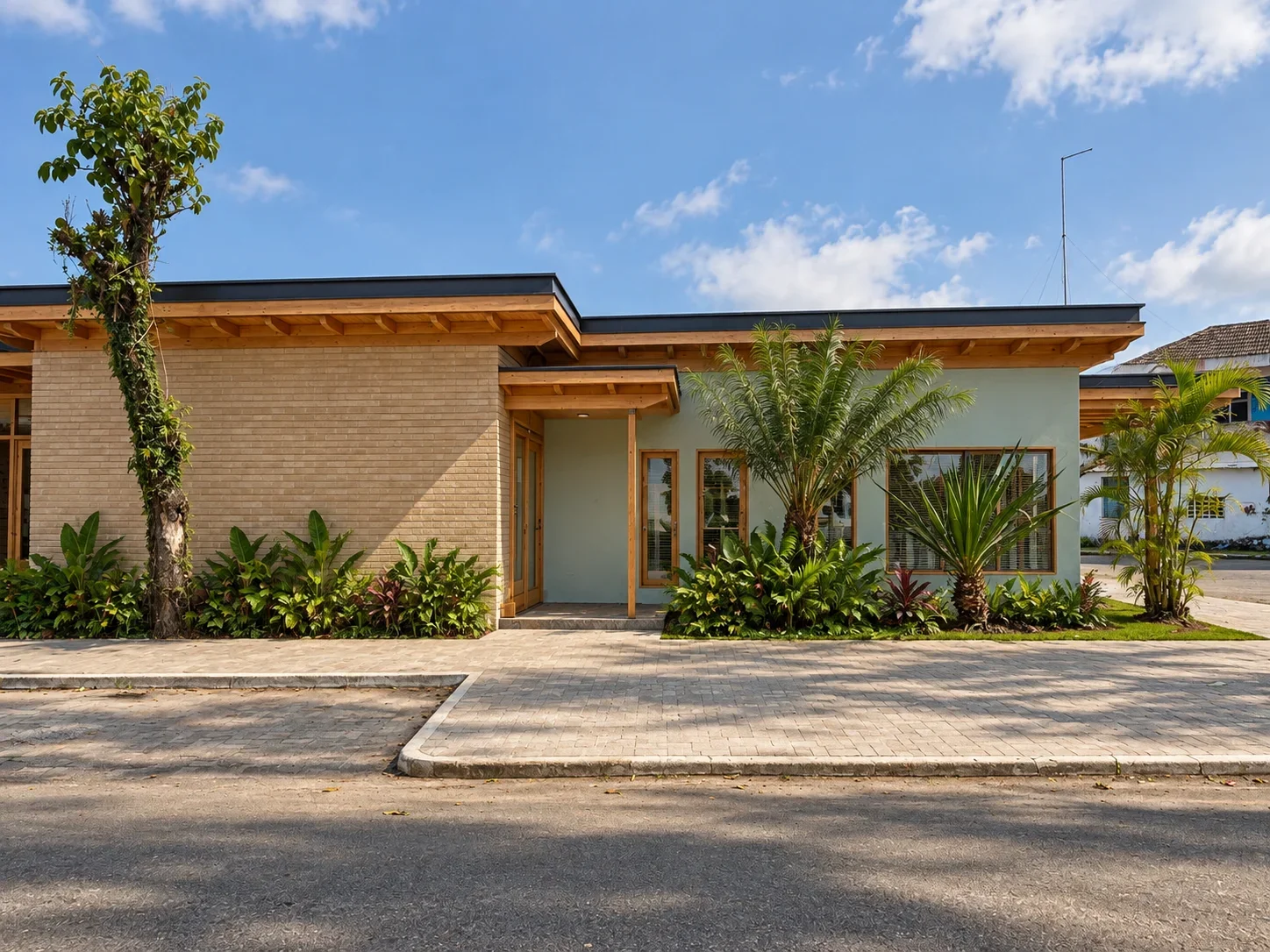 Sunlit Modern Tropical Building Facade.webp