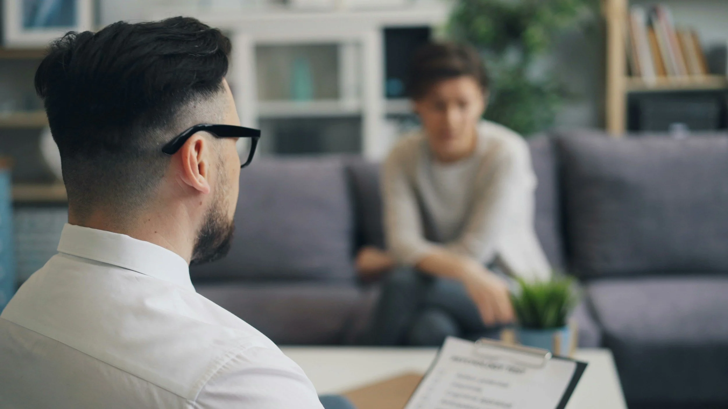 Therapist talking with client during a session
