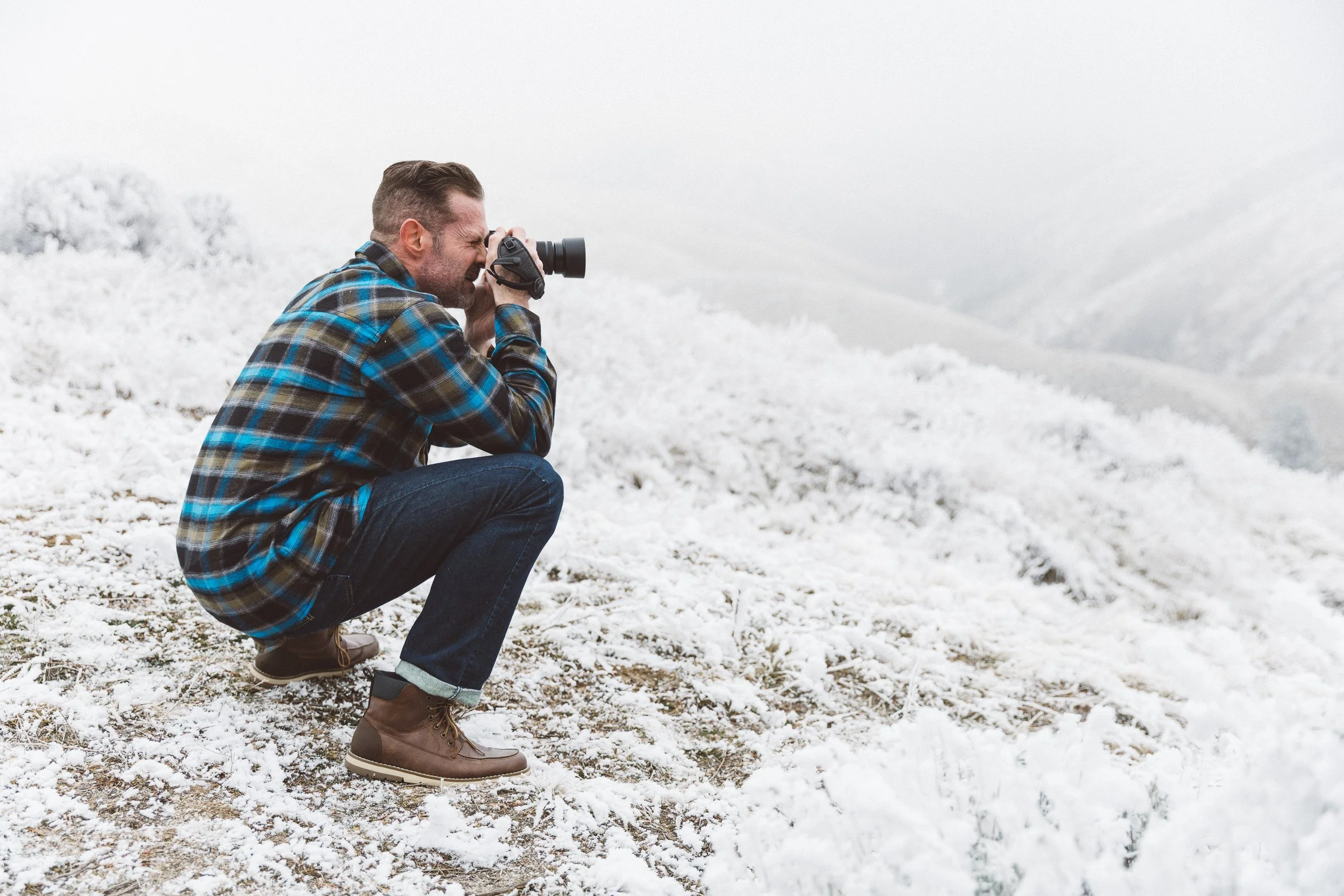 Boise branding photographer capturing outdoor branding photos for a creative entrepreneur in the Boise foothills on a foggy day.