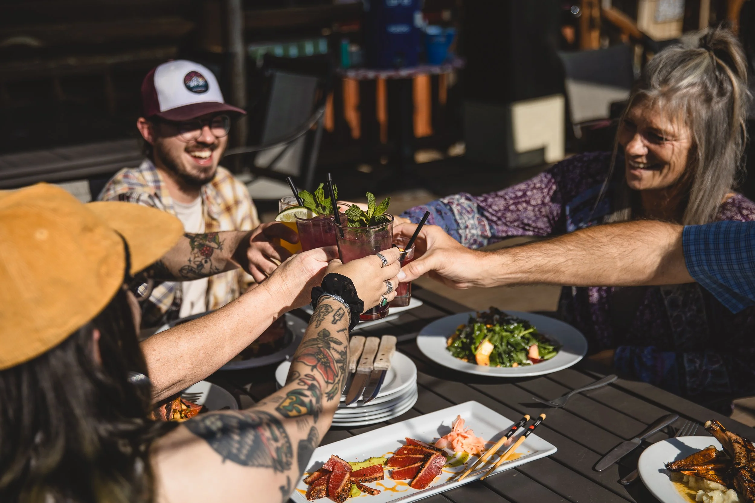 Friends eating at a restaurant in Stanley Idaho during a branding photography session.