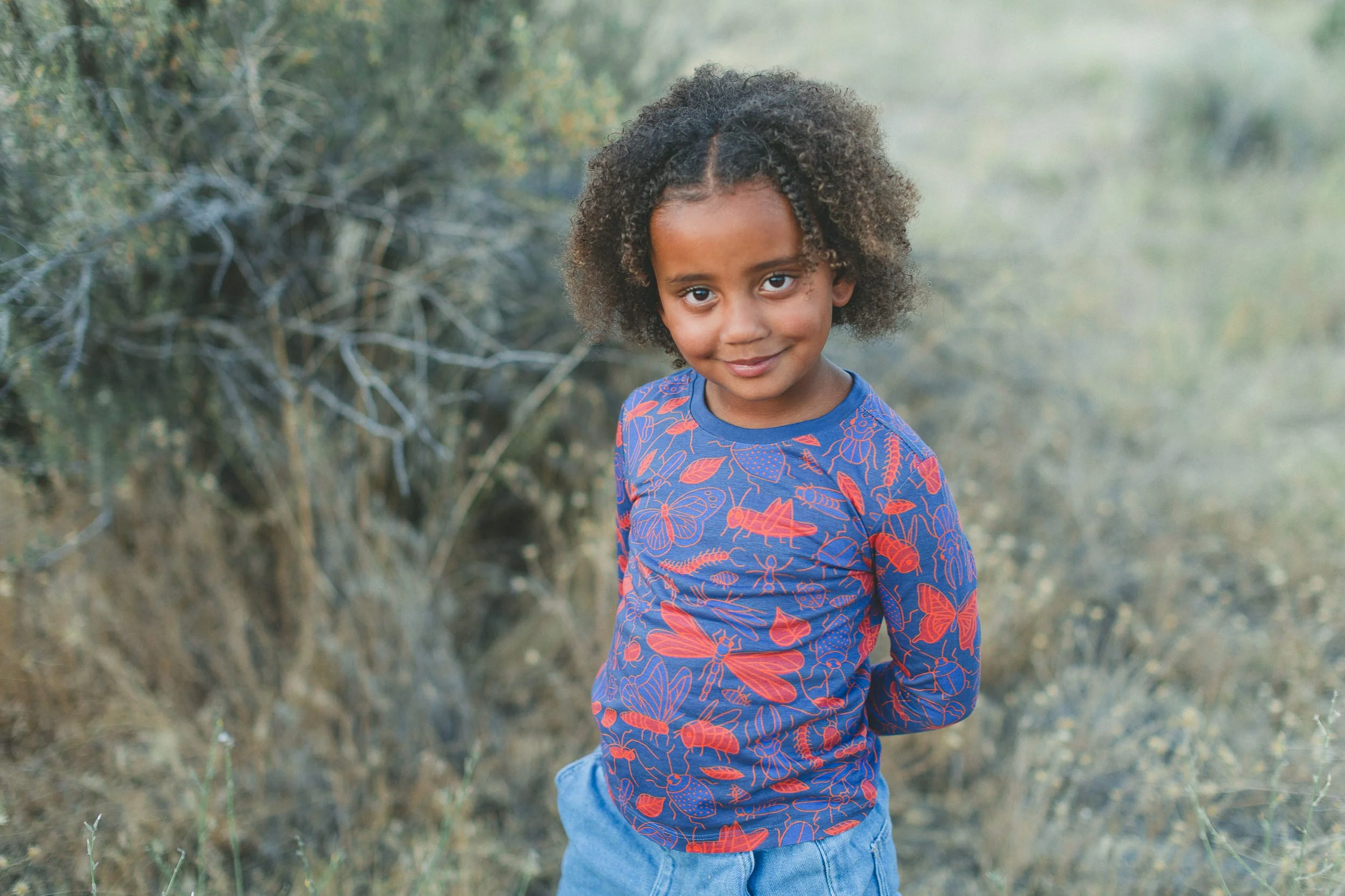 Lifestyle product photography showing custom children’s clothing created for a Boise based brand.