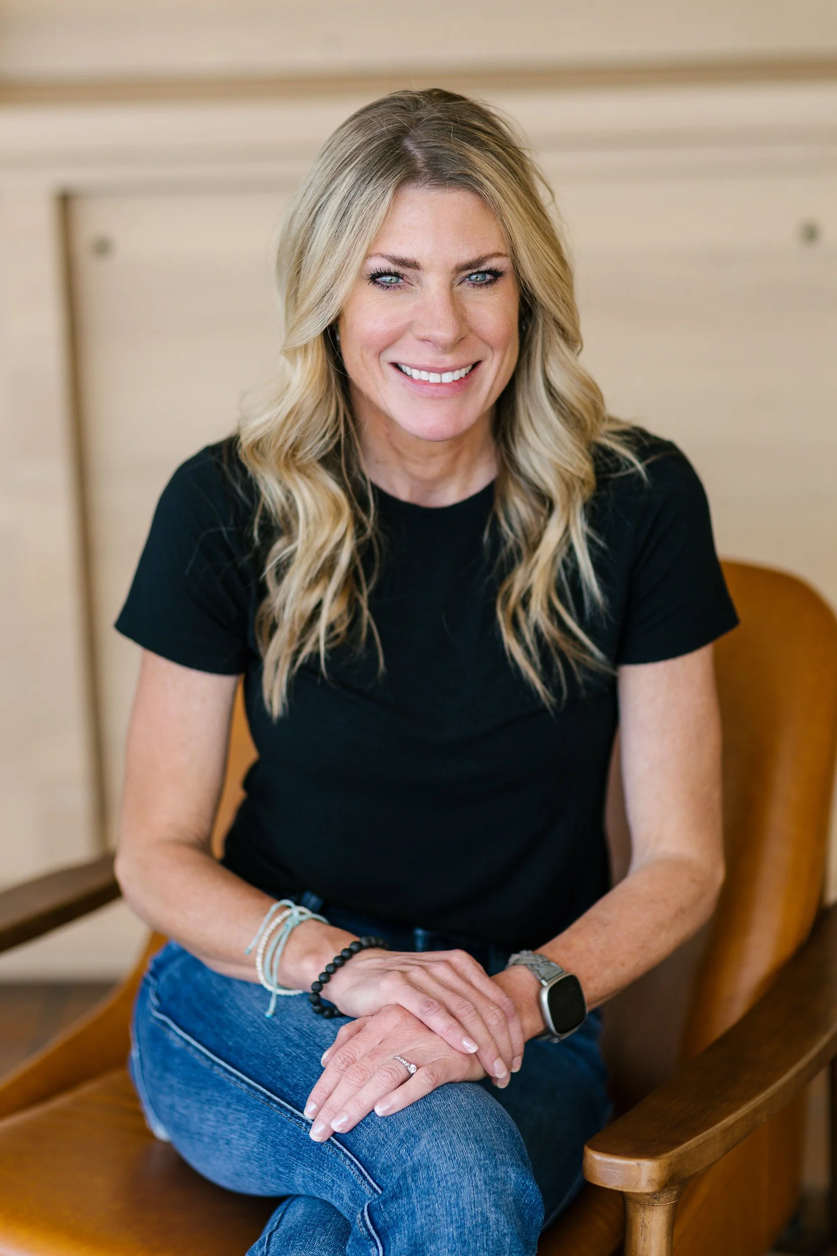 Headshot of a woman business owner smiling during a branding photoshoot in Boise, Idaho.