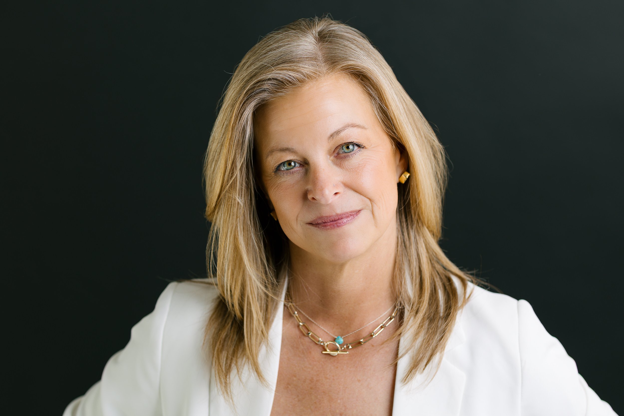 Studio headshot of a keynote speaker during a branding photo session at a studio in downtown Boise.