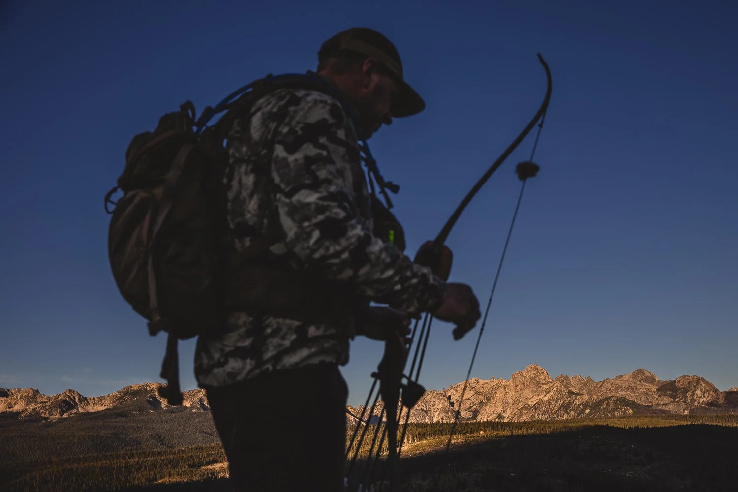 Outdoor lifestyle archery hunting photography session in the Sawtooth Mountains of Idaho