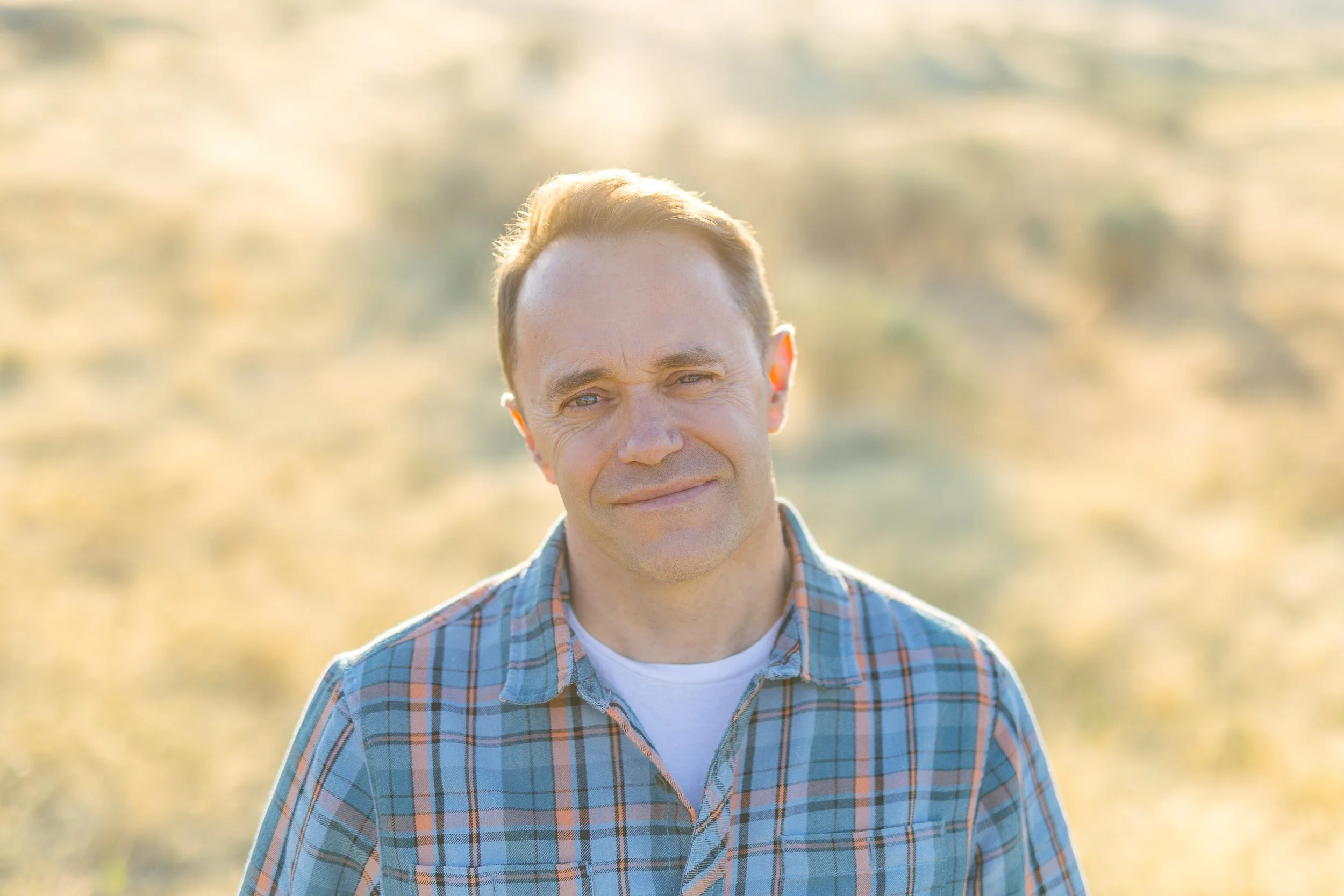 Outdoor authentic portrait of a counselor during a branding photoshoot at Table Rock in Boise.