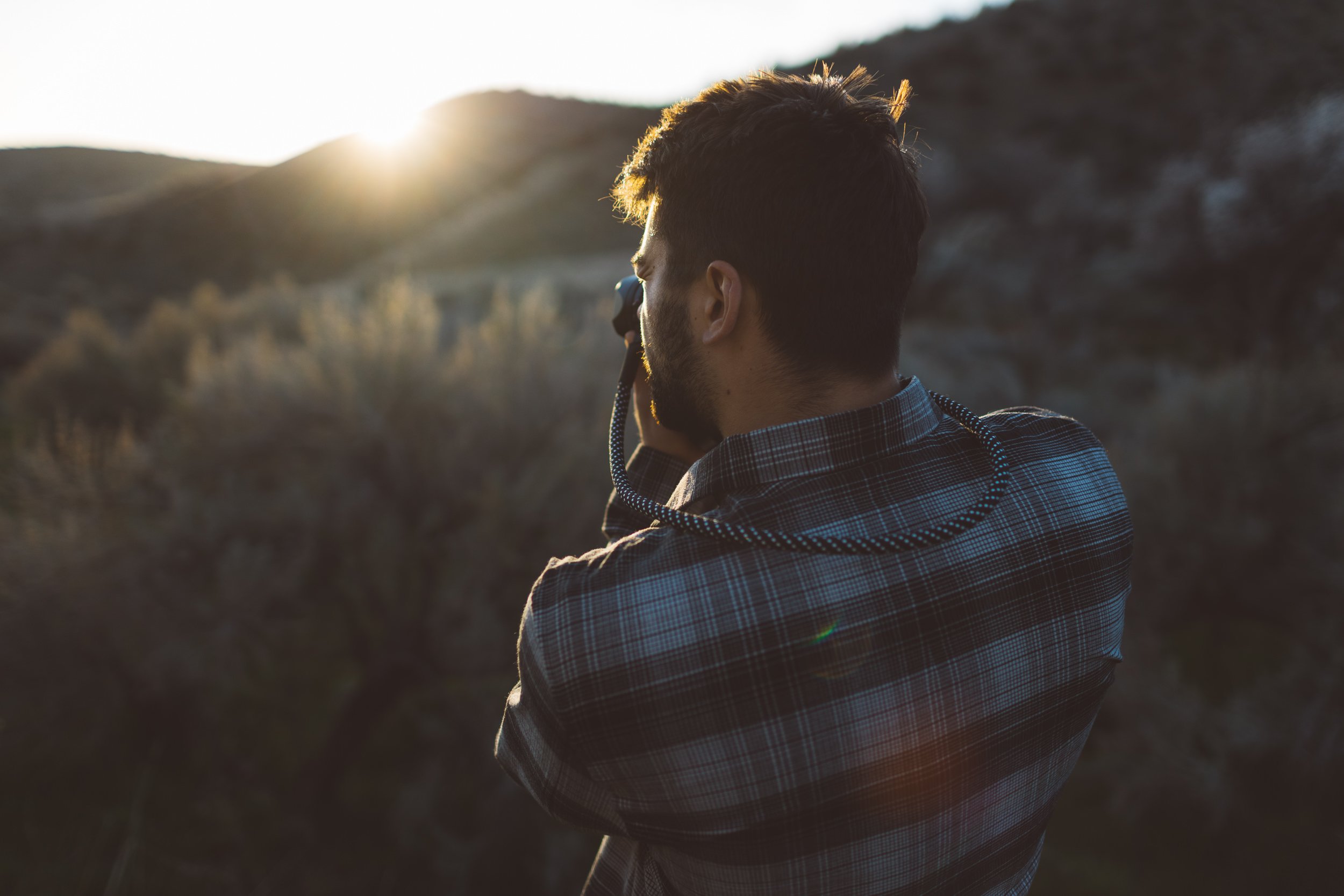 Outdoor branding photoshoot in the Boise foothills during golden hour for a creative entrepreneur