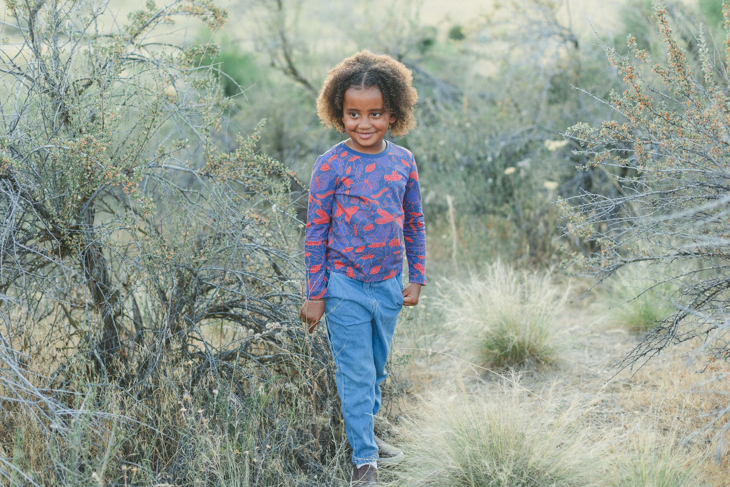 Natural lifestyle brand photography for a children’s clothing business in Boise using outdoor scenery.