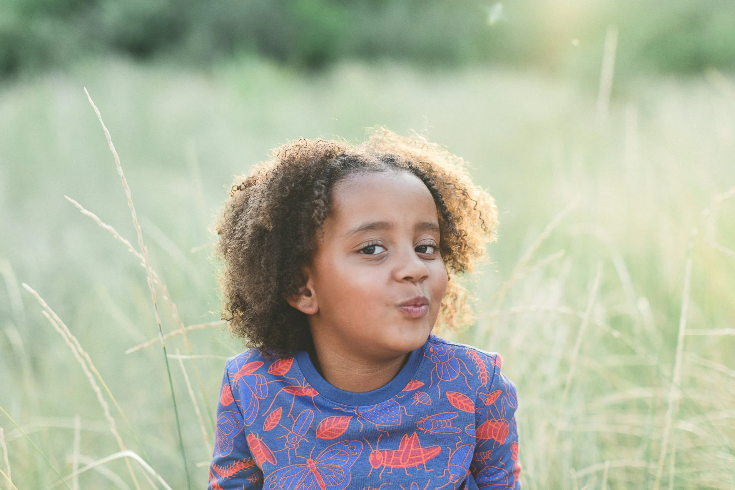 Boise branding photographer capturing a lifestyle branding photoshoot for a children’s clothing brand in the Boise foothills at sunset.