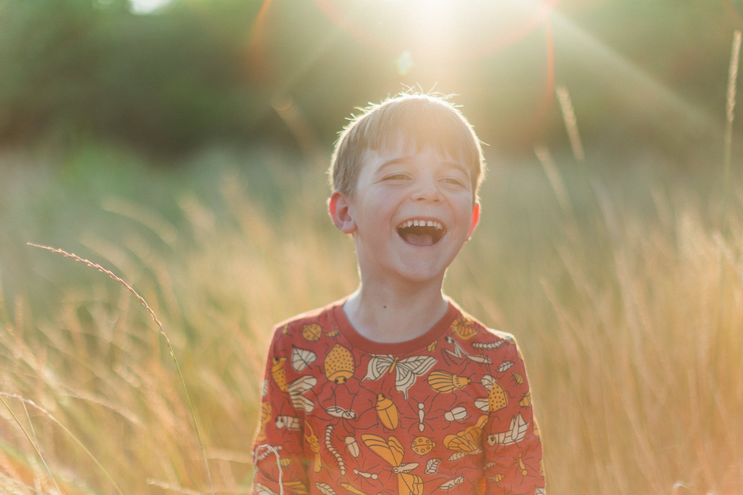 Boise branding photographer photographing a children’s clothing brand during a sunset lifestyle brand session.