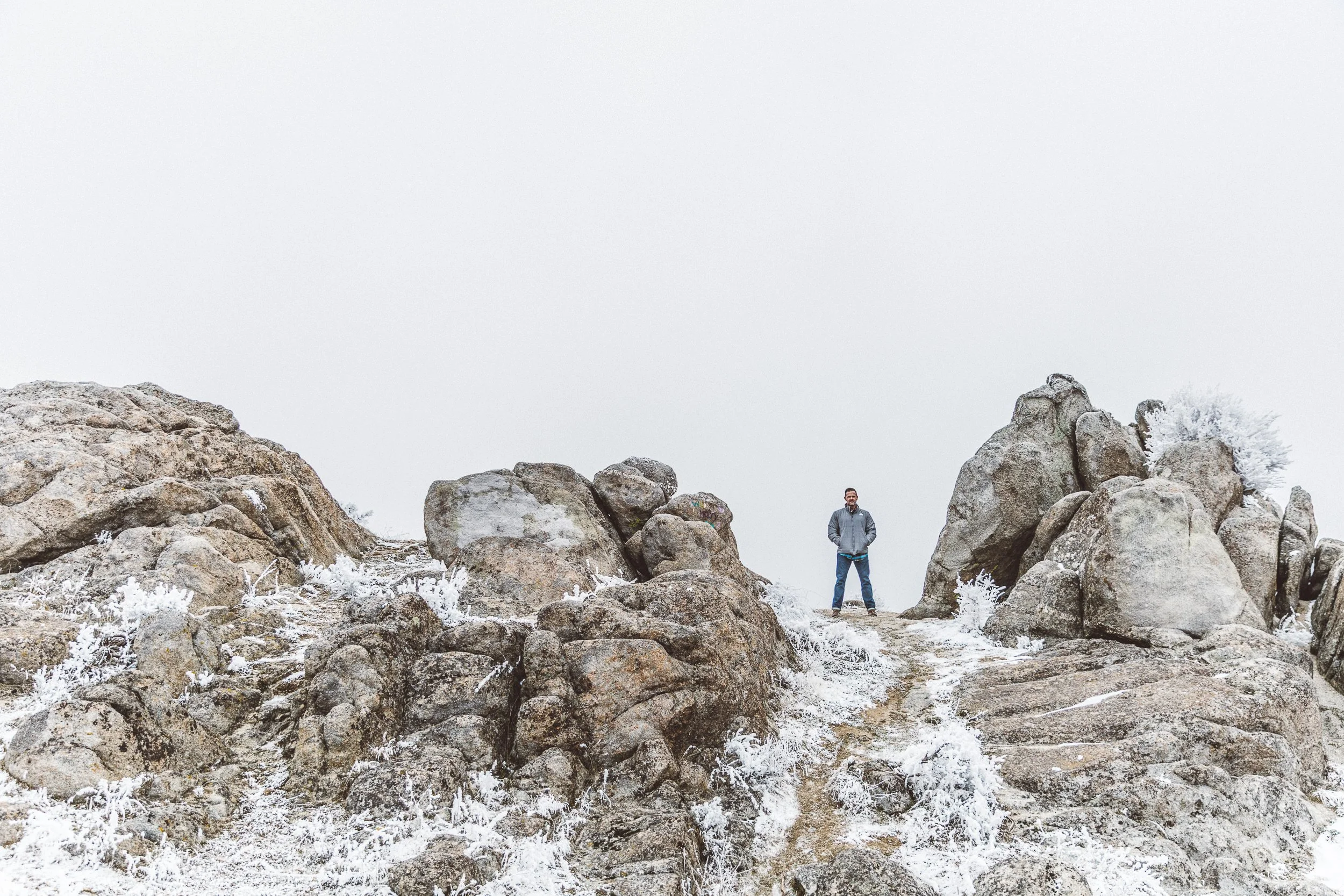 Boise branding photographer capturing authentic outdoor branding photos for an male entrepreneur in the Boise foothills on a foggy day in winter.