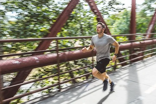 Branding photo of an entrepreneur during a personal brand photography session on the greenbelt in Boise, Idaho.