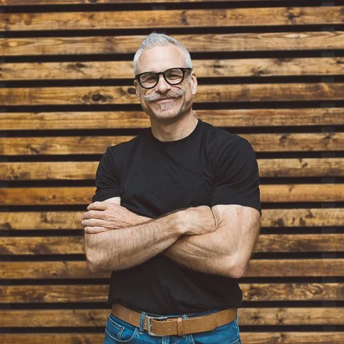 Outdoor branding photography session showing a business owner photographed in Boise, Idaho.
