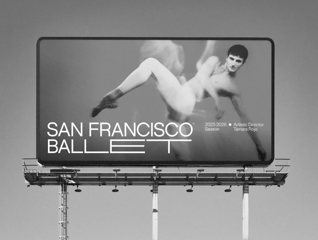 Billboard advertising the San Francisco Ballet, featuring a dancer in a dramatic pose with text about the 2025-2026 season and artistic director Tamara Rojo.