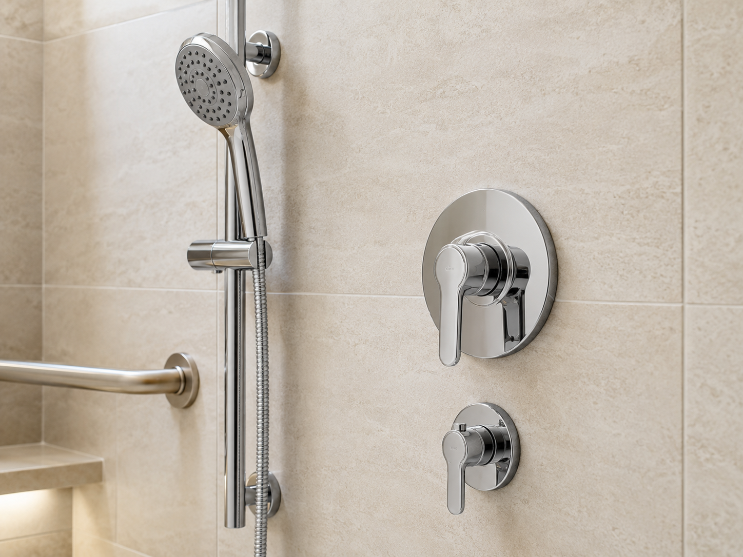 Reachable shower controls and handheld shower