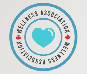 A circular logo for Wellness Association featuring a blue heart at the center, with the organization's name written around it and two red maple leaf symbols.