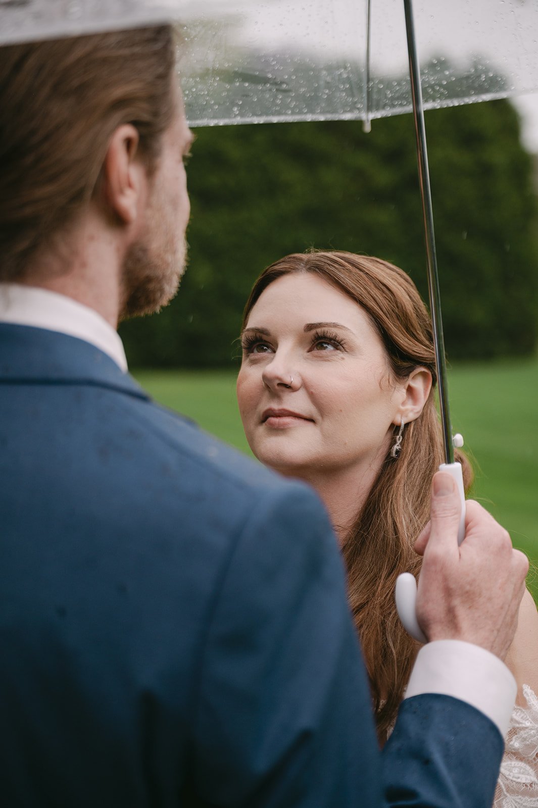 Bride and groom portriat during a rainy day.JPG