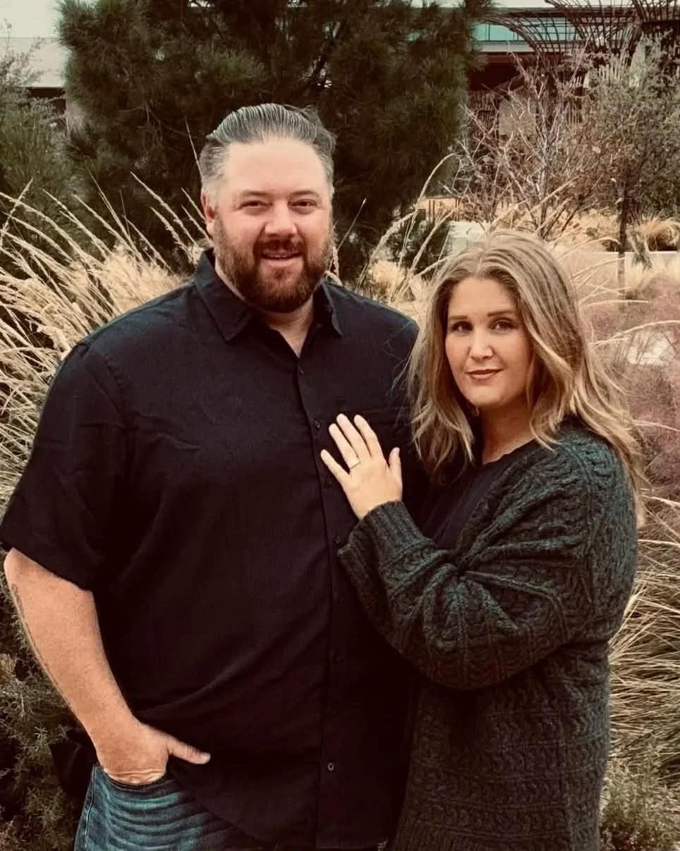 Perfect representation of love, family, and nature during autumn. #CoupleGoals #FallPhotography #OutdoorPortrait #LoveInNature #CozyVibes #LifestylePhotography #EngagementStyle #AutumnAesthetic"