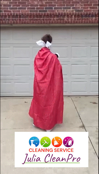 A young girl dressed as Little Red Riding Hood holding a basket, standing in front of a garage door with a sign that reads "Cleaning Service Julia CleanPro" along with colorful icons.