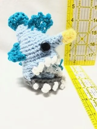 Mama Angler fish with mouth full of babies.jpg