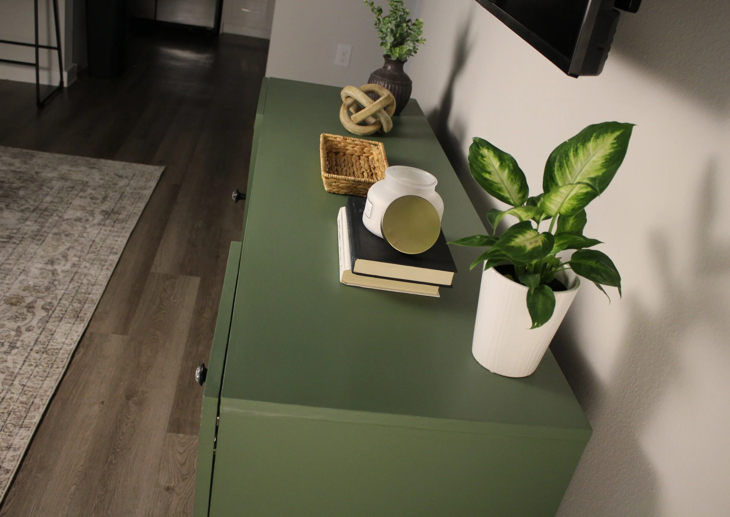 Sage green media console finish detail