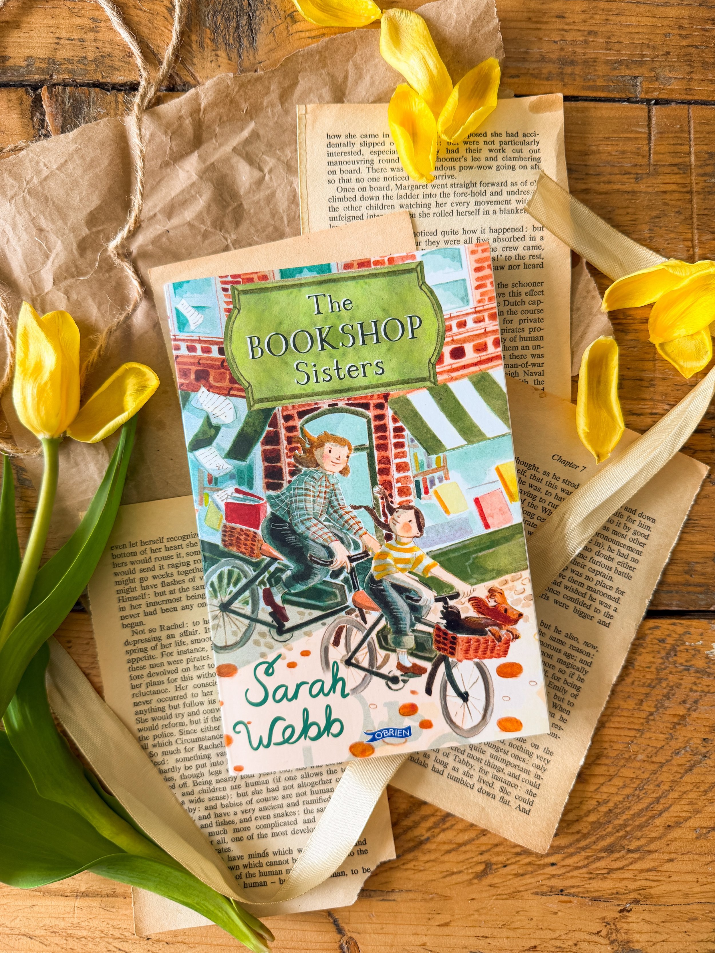 &ldquo;The Bookshop Sisters&rdquo; by @sarahwebbwriter is about Rosy and Martha, sisters who are evacuated to Dublin during WW2, where they find themselves surrounded by books, secrets, and unexpected adventures as they stay in their aunt&rsquo;s boo
