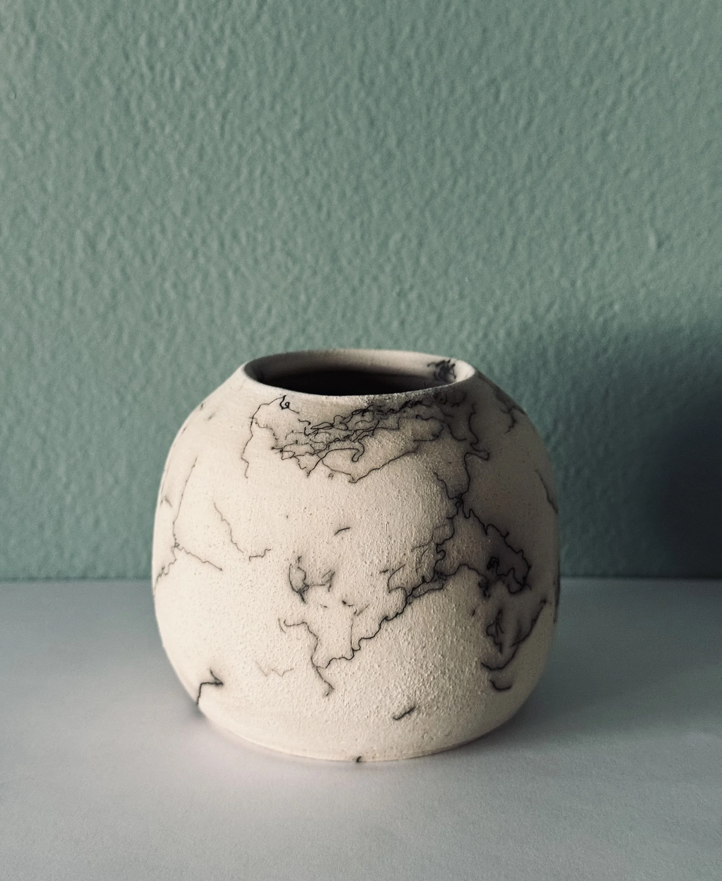 Animal hair raku moon jar. 2025.