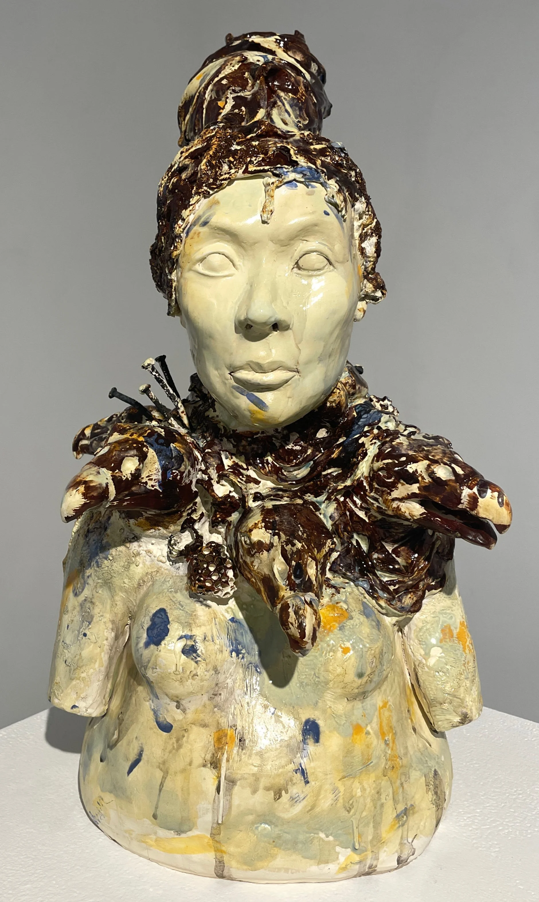 Consumption. 2025. White earthenware, found objects. 11”x20”x11.5”.