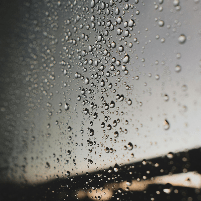 water droplets on dark glass