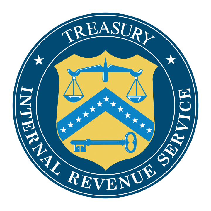 Seal of the Internal Revenue Service featuring a shield with scales of justice, chevron with stars, and a key, surrounded by a circular border with the words 'Internal Revenue Service' and 'Treasury'.