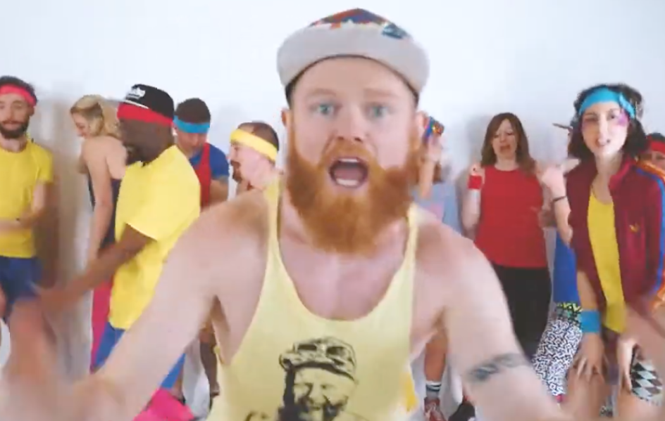 Danny Bent leading a colourful 1980s-style group workout