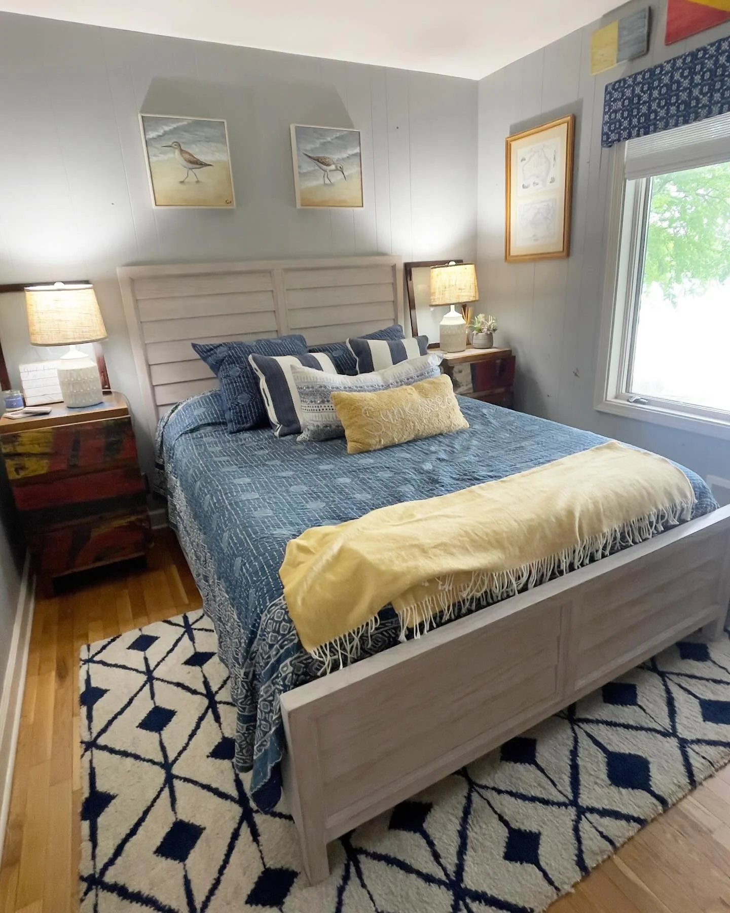 Proof that a guest room doesn&rsquo;t have to be boring!

A fun, color-forward boho quilt sets the tone, while authentic boatwood nightstands (yes&mdash;made from recycled fishing boats 🙌) add that perfectly imperfect texture.

Inviting, vibrant, an