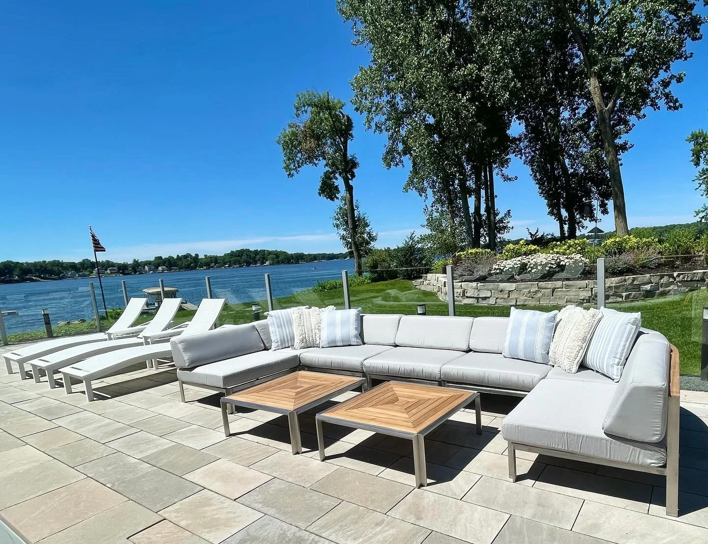 Happy June 1st! 🌊

If you know me, you know outdoor living spaces are one of my favorite projects to design.

This beautiful poolside setting overlooks the lake and combines clean modern lines with soft, curved silhouettes that make the space feel b