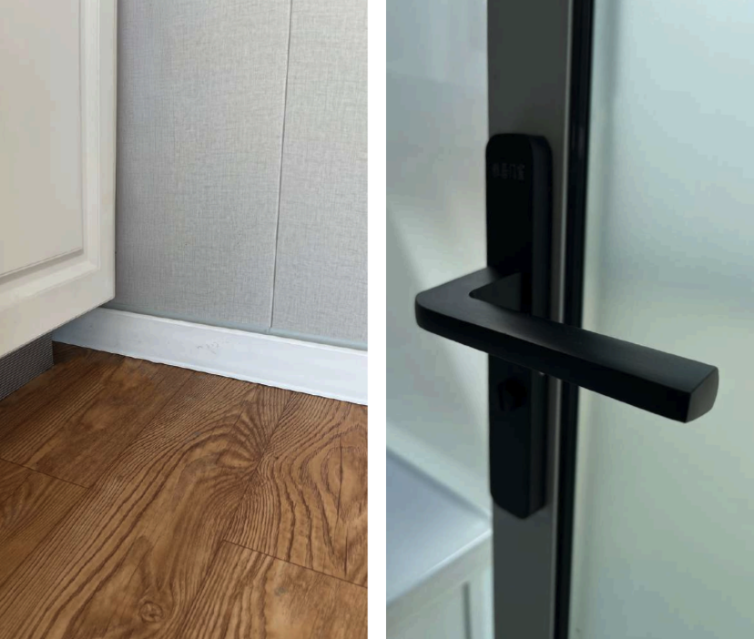 Close-up of a door handle on a modern door with a white wall and wooden floor.