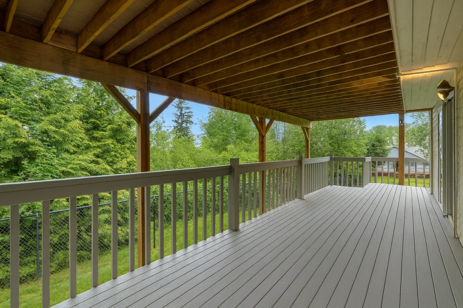 Spacious Covered Deck with Serene View 2.PNG