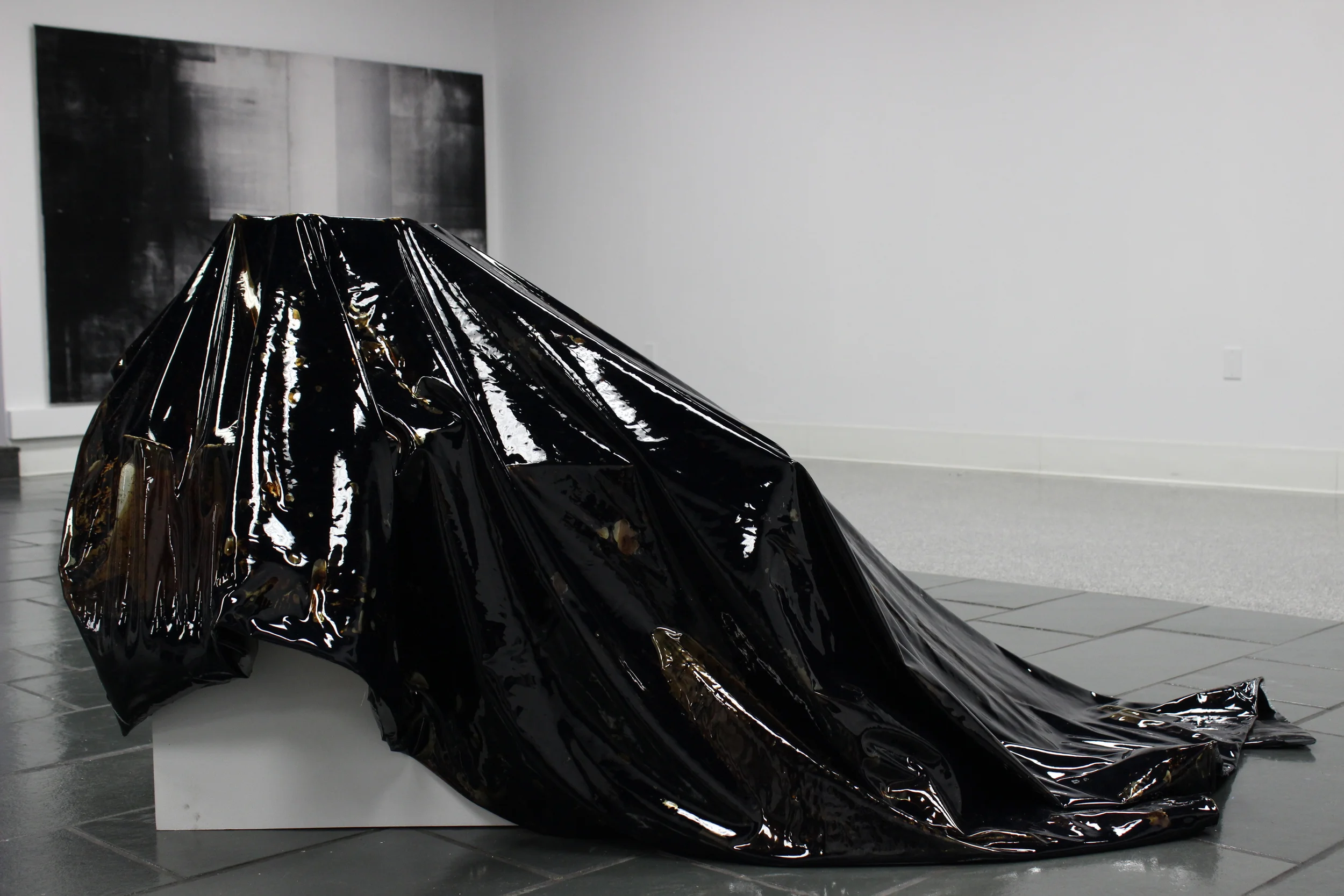  Liquid tar encapsulated in vinyl, gallery pedestal, found object (lamp shade) 