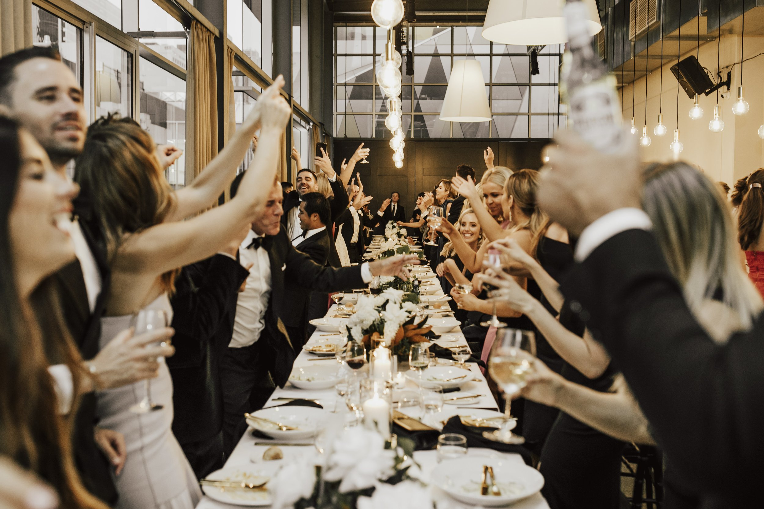 Wedding guests dining and dancing at Alto Event Space Melbourne