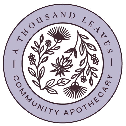 A Thousand Leaves round logo with passionflower line drawings and the name circled around it.