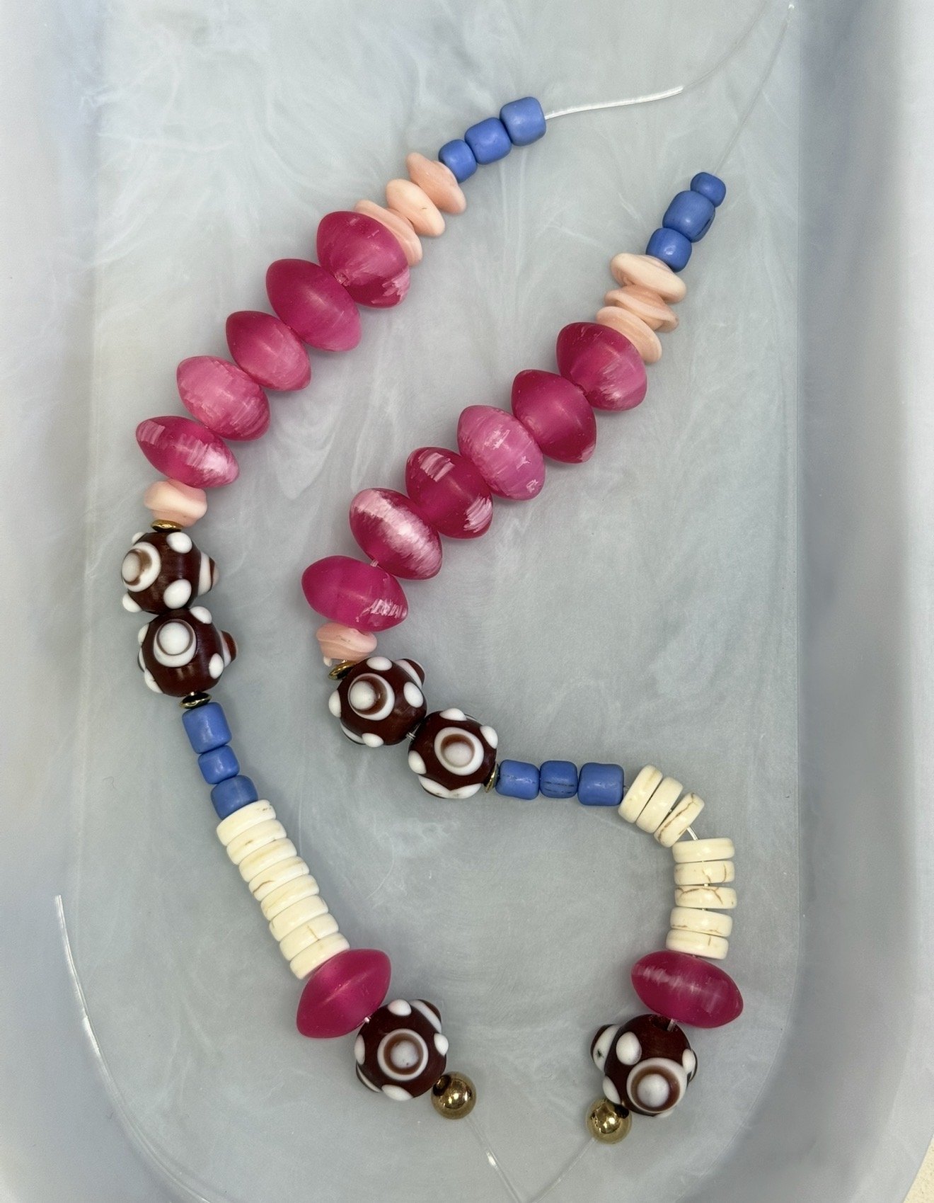 brown and pink flatlay.jpg