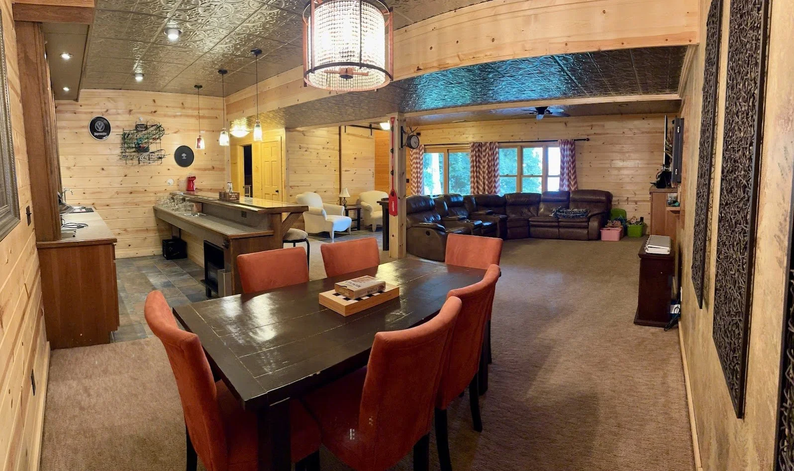 Basement living area for games, darts, television and laughs