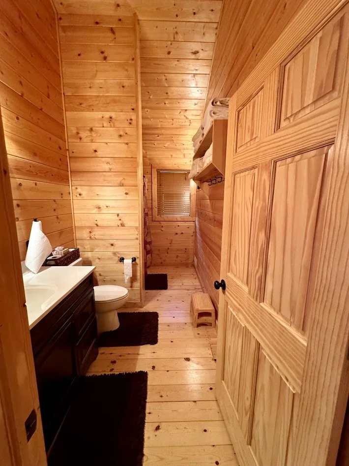 Upstairs bathroom with tub and shower
