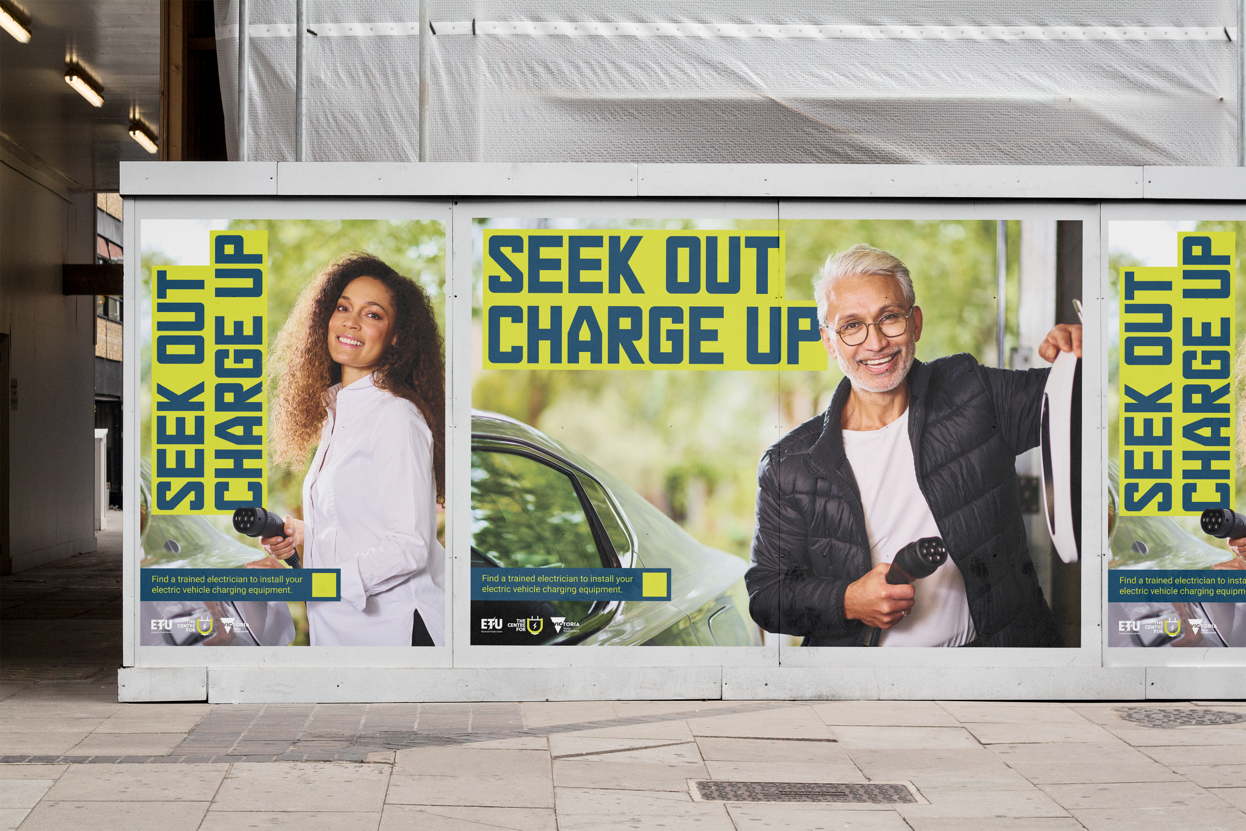 Three posters with the message "Seek out charge up" promoting electric vehicle charging. The posters feature a woman holding an electric car charging plug and a smiling older man holding an electric vehicle charging cord, both standing outdoors near electric vehicles, with greenery in the background.