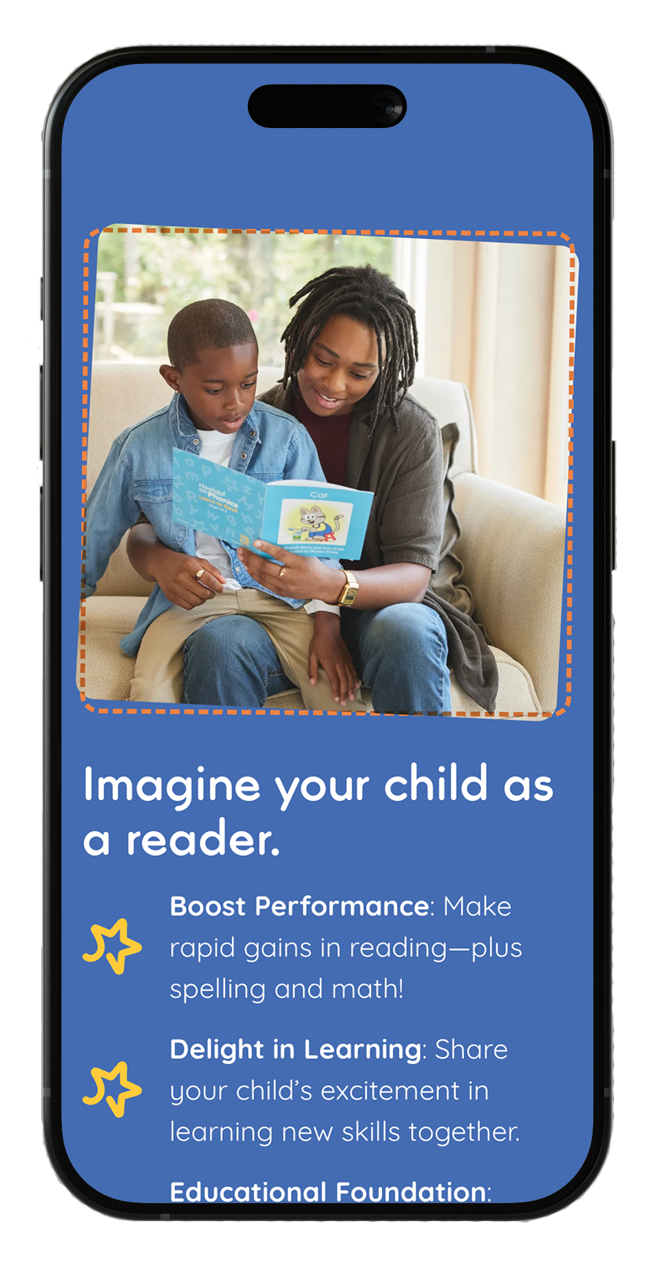 A woman and young boy sitting on a beige sofa, reading a children's book together in a bright room with large windows.