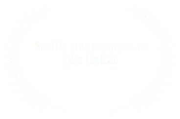 A black-and-white award emblem with the words "WINNER Seattle True Independent Film Festival BEST COMEDY 2008" surrounded by laurel branches.