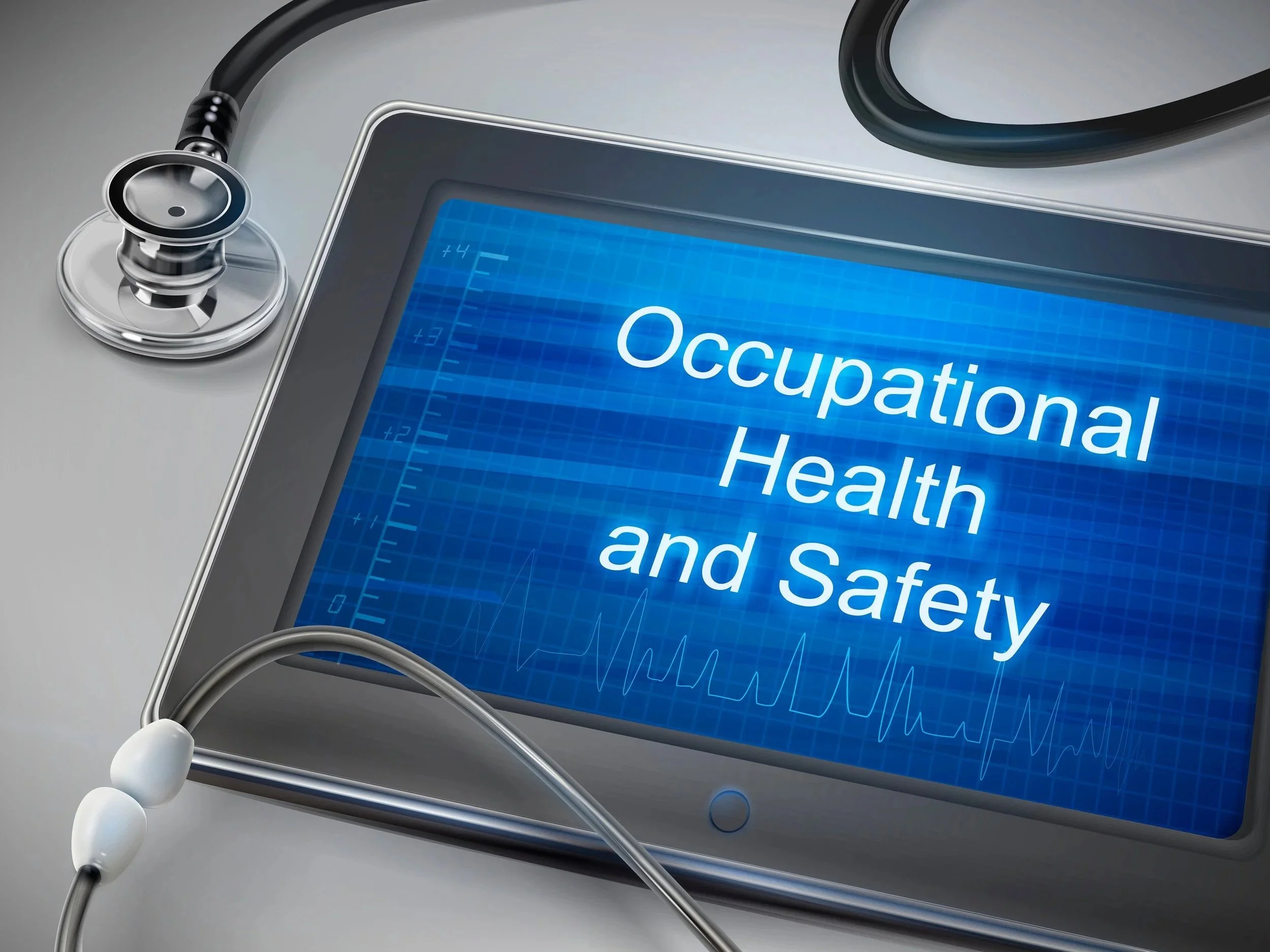 A medical monitor displaying the words 'Occupational Health and Safety' with a stethoscope placed on the side.